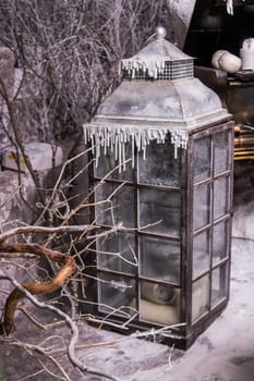 Christmas a lantern on the window. Shabby style and winter concept