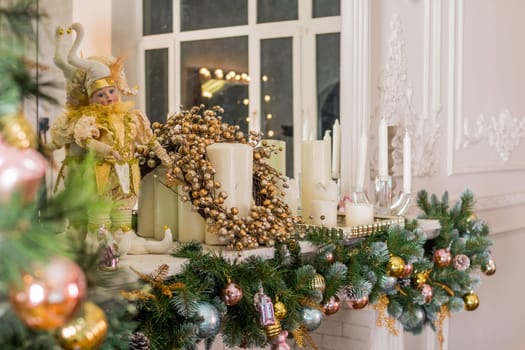 Beautiful holiday decorated room with Christmas tree, fireplace and with presents. Cozy winter scene. White interior.