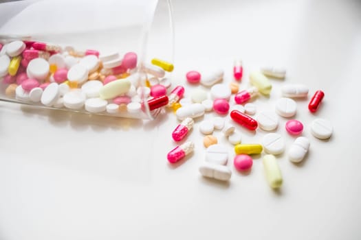 medical capsules. Pharmaceutical medicament. Antibiotic painkiller or narcotic.Many different colorful pills. Drugstore set. Selective focus.