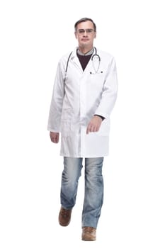 qualified doctor with stethoscope going forward. isolated on a white background.