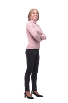 Full length, side view of a confident business woman standing with folded hands isolated over white background