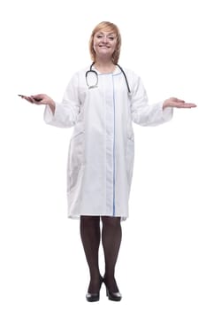 in full growth.Mature female doctor with smartphone . isolated on a white background.