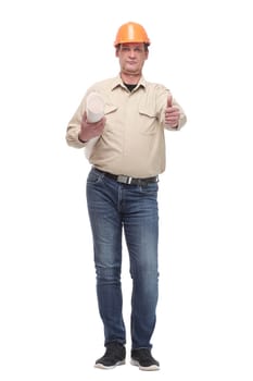 Construction worker holding blueprints and giving thumbs-up against white background