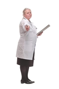 Female doctor in blue scrubs pointing pen at camera. Concept of you are next