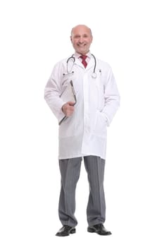 Full length portrait of a mature doctor holding a clipboard and posing isolated on white background