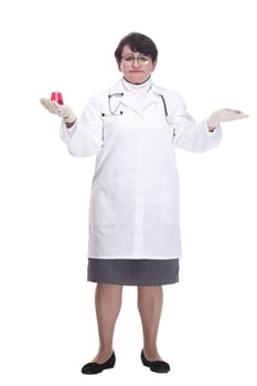 in full growth. senior female medic with a laboratory flask. isolated on a white background.