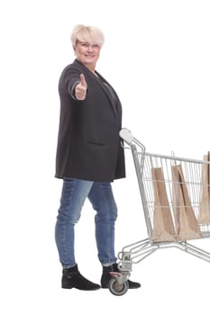 full-length. casual mature woman with shopping cart . isolated on a white background.