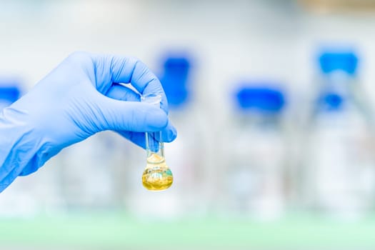 chemical substance in a glass test tube in a research laboratory. genetic test. High quality photo