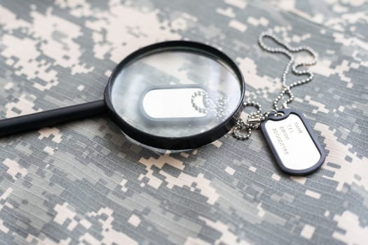 magnifier on green military uniform.