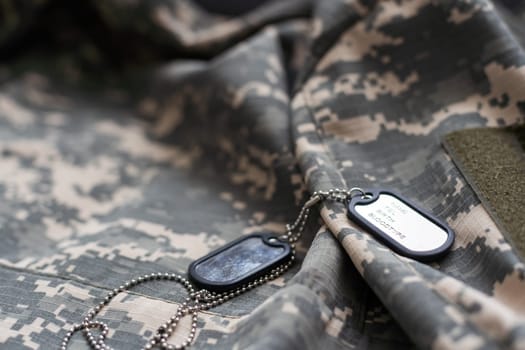 Close-up of the surface of the military uniform of the Ukrainian military.