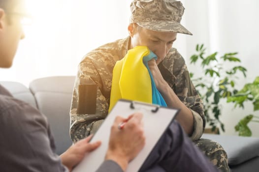 Psychologist working with military officer from Ukraine.