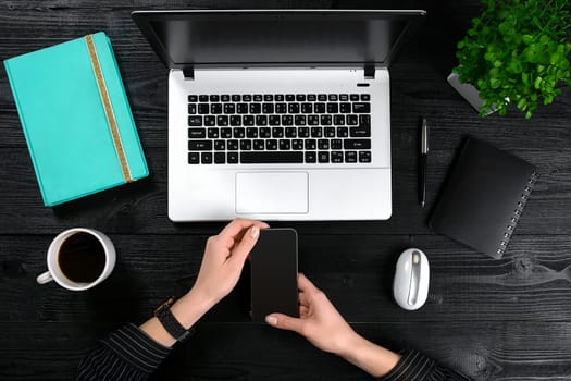 Overhead view of businesswoman working at computer in office. Place for your text. Ideal for blog. Flat lay