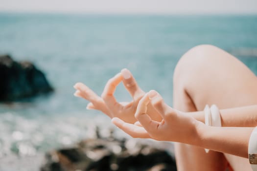 Close up Hand Gesture of Woman Doing an Outdoor Lotus Yoga Position. Close up. Blurred background