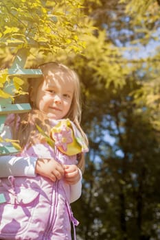 Image of smiling cute girl posing looking at camera