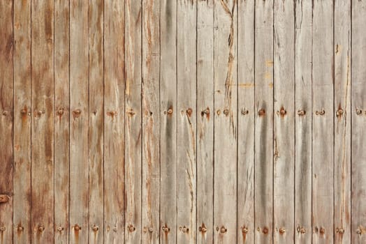 The texture of light wood planks vertical