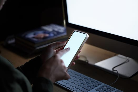 Blank computer, phone screen and woman hands typing on technology for coding. Mobile connection, 404 glitch and programming on it software in the dark with a female coder employee at a office desk.