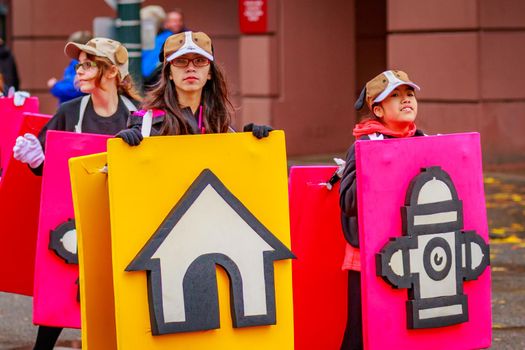 Portland, Oregon, USA - November 25, 2016: Costumed characters march in the annual My Macy's holiday Parade across Portland Downtown.