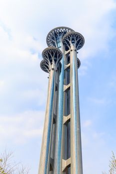 Beijing, China - April 02, 2015: The Olympic Park Observation Tower, stands at 258 meter,  is likened to "huge nails".