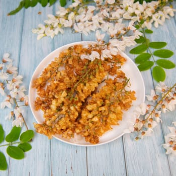 Acacia flowers fritters, Blossoming acacia with leafs, , Robinia pseudoacacia, White acacia, High quality photo
