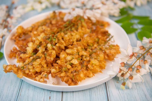 Acacia flowers fritters, Blossoming acacia with leafs, , Robinia pseudoacacia, White acacia, High quality photo