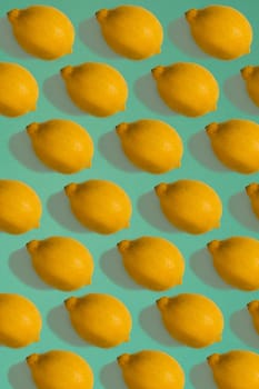 Lemon pattern isolated on blue background. Flat lay. Print