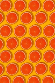 Grapefruit pattern on yellow background. Minimal flat lay concept. Print