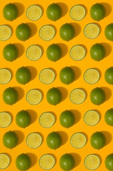 Lime pattern on yellow background. Minimal flat lay concept. Print