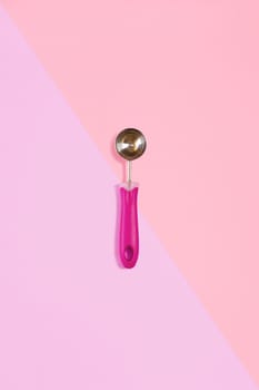 Ice cream scoop isolated on pink. Top view. Copy space. Flat lay