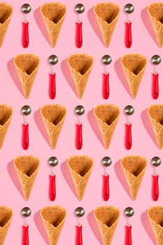 Ice cream cones pattern. Pink background. Sweet, summer and empty concept. Top view. Flat lay