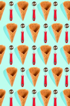 Ice cream cones pattern. Turquoise background. Sweet, summer and empty concept. Top view. Flat lay