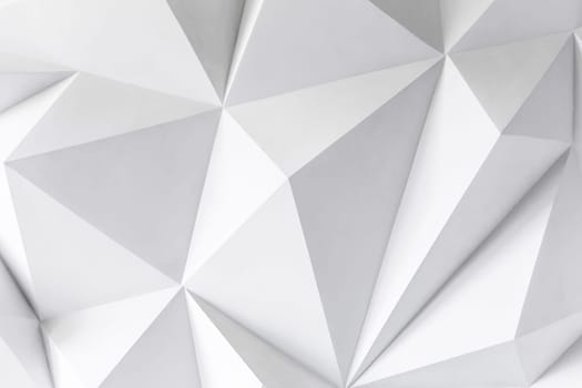 Photo of abstract background of polygons on white background. White texture.