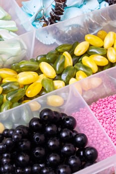 Colorful beads in containers close up, handicrafts, macrophoto