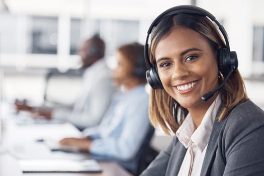 Woman, call center and portrait smile with headset for telemarketing, customer service or support at office desk. Happy female consultant or agent smiling with headphones for online advice or help.