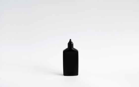 Mock up unbranded black bottle of finish line dry bicycle lubricant. Bicycle care, bicycle chain care