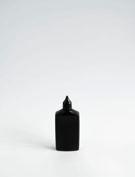 Mock up unbranded black bottle of finish line dry bicycle lubricant. Bicycle care, bicycle chain care