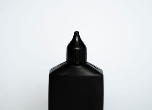 Mock up unbranded black bottle of finish line dry bicycle lubricant. Bicycle care, bicycle chain care