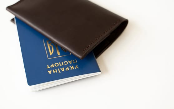Ukrainian biometric passport id with a genuine leather cover on a white background