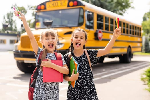 Two little kids going to school together.