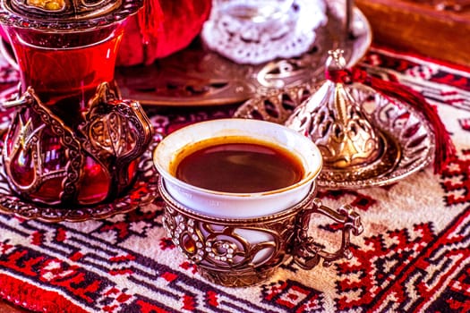 Turkish tea and sweets in decorative ware, candies