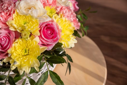 Background of beautiful bouquet of rose and chrysanthemums flowers. Backdrop for holiday, birthday,