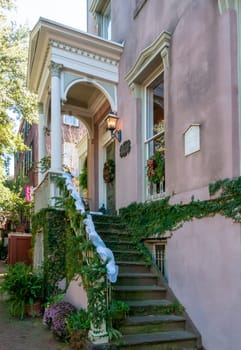 SAVANNAH, USA - DECEMBER 02, 2011: traditional interior decorating of old houses with plants and flowers in the city of Savannah