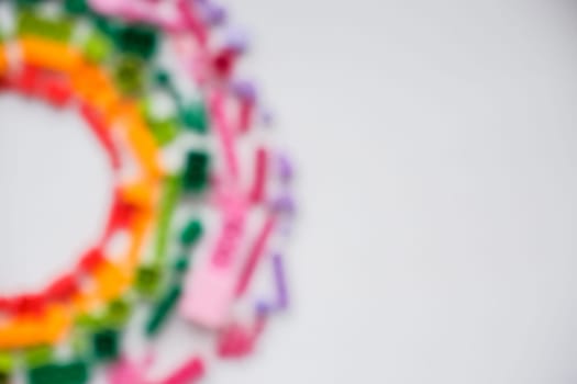 defocused colorful constructor set for children .Multicolored plastic building blocks of the designer.