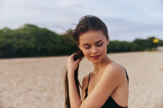 beach woman enjoyment vacation leisure smile summer sun freedom adult nature walk sand happiness ocean sea relax coast female lifestyle sunset