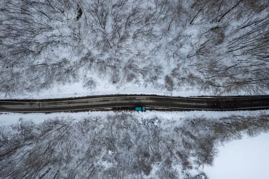 Aerial view of snowy mountain winter white landscape Vezzolacca , Emilia Romagna, Italy