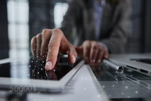 businessman pressing his finger on the screen of the digital tab