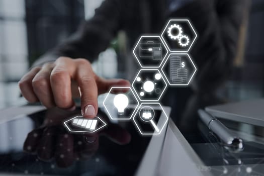 businessman pressing his finger on the screen of the digital tab