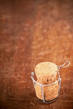Old wine bottle corks on the wooden background.Vintage background with empty space for text