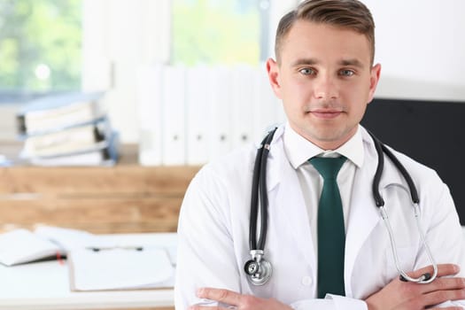Male medicine doctor his chest in office. Medic store, physical and patient disease prevention er consultant body 911 profession pulse measure healthy lifestyle concept