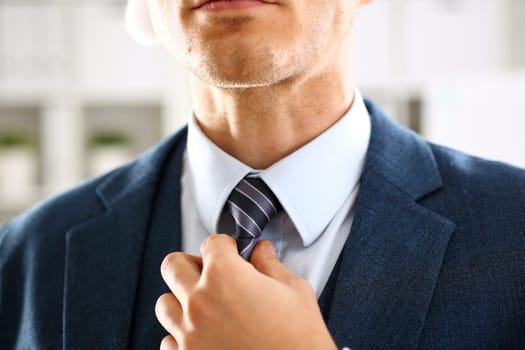 Male arm in blue suit set tie closeup. White collar management job serious move secretary student luxury formal interview executive agent marriage store corporate elegance employment preparation