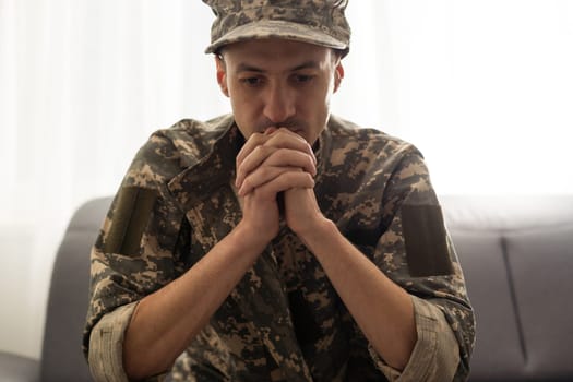 Soldier sitting and talking to his therapist.